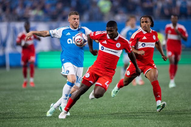 September 26, 2026: Chicago Fire FC defender Mbekezeli Mbokazi (4) elbow s the ball away against Charlotte FC midfield Pep Biel (16) during the first half of the MLS, Fussball Herren, USA match up at Bank of America Stadium in Charlotte, NC. Mandatory Credit: -Cal Media Charlotte United States - ZUMAc04_ 20260926_zma_c04_399 Copyright: xScottxKinserx