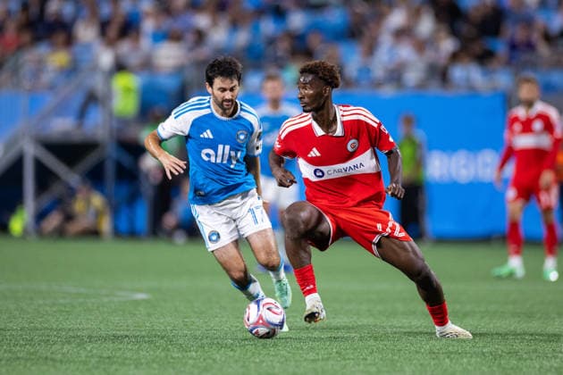 September 26, 2026: Chicago Fire FC midfielder Dje DÃ¢â‚¬â ¢avilla (42) dribbles around Charlotte FC midfielder Luca de la Torre (17) during the first half of the MLS, Fussball Herren, USA match up at Bank of America Stadium in Charlotte, NC. Mandatory Credit: -Cal Media MLS 2026: Chicago Fire At Charlotte FC Sep 26  - ZUMAc04_ 20260926_zma_c04_409 Copyright: xScottxKinserx