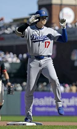 Baseball: Dodgers vs. Giants Los Angeles Dodgers designated hitter Shohei Ohtani poses after hitting an infield single in the fifth inning of a baseball game against the San Francisco Giants at Oracle Park in San Francisco on Sept. 26, 2026.  A14AA0005628839P