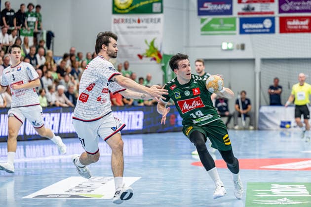 2. Handball Bundesliga; TV Hüttenberg - GWD Minden, 26.09.26 Jakub Å terba (GWD Minden, 19). Hendrik Schreiber (TV Hüttenberg, 51) 2. Handball Bundesliga; TV Hüttenberg - GWD Minden: Hüttenberg, 26.09.26 Copyright: xBEAUTIFULxSPORTS Roeczeyx