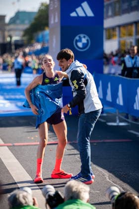 BERLIN, GERMANY - SEPTEMBER 27, 2026: Anna Langerwisch (GER, Marathon Team Berlin) and Coach Timo Göhler at the Finish by the 52. BMW Berlin Marathon at Berlin on September 27, 2026 in Berlin, Germany. Copyright: xBEAUTIFULxSPORTS Kuehnx