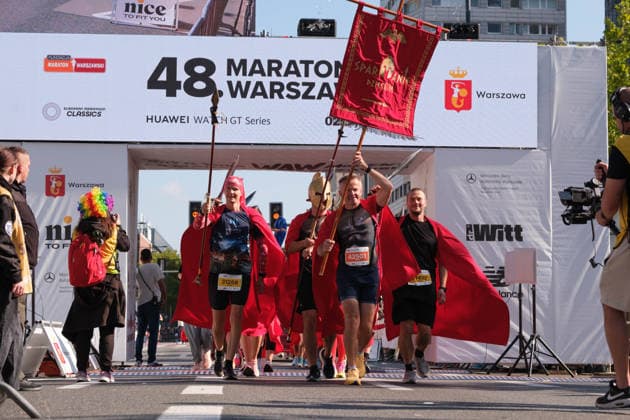 September 27, 2026, Warsaw, Masovian Voivodeship, Poland: Runners of the Spartans for Children Foundation cross the finish line of the Nice To Fit You Warsaw 10k Run as part of the 48th Warsaw Marathon. The race has been awarded the World Athletics Elite Label for the first time in its history and is part of the European Marathon Classics (EMC) series of races. Warsaw Marathon 2026  - ZUMAk204 20260927_zip_k204_054 Copyright: xRomanxKozielx