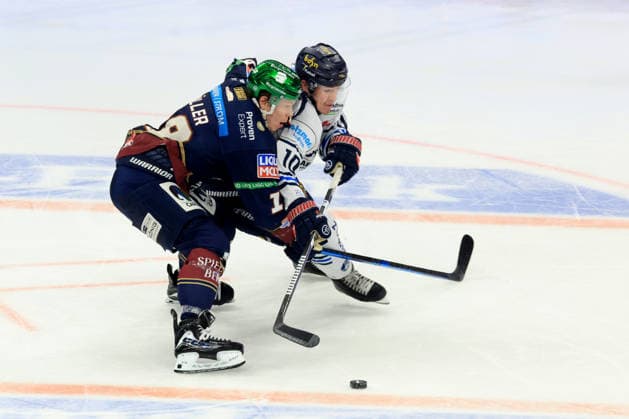 27.09.2026, GER ,DEU, Deutschland, Jonas Mueller ( Eisbaeren Berlin 18 ), Tyler Boland (Iserlohn Roosters 10) nordphoto GmbH Engler Berlin Uber-Arena Berlin Deutschland Copyright: xNordphotox xEnglerx