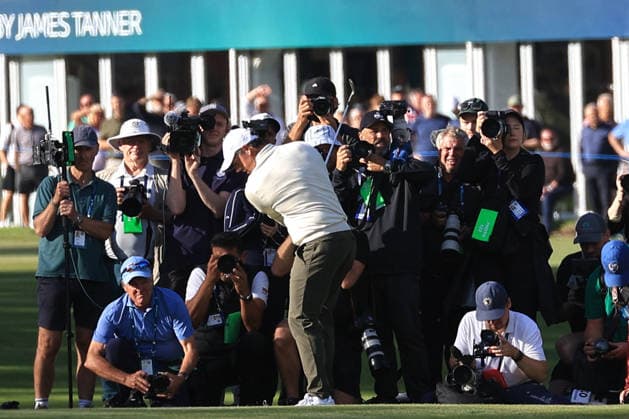RECORD DATE NOT STATED 20th September 2026; Wentworth Golf Club, Virginia Water, Surrey, England; DP World Tour Golf, BMW PGA, Golf Herren Championship, Final Day; Rory McIlroy of Northern Ireland decides plays an iron shot into the 18th green with photographers behind him JeremyxGowers-Cromie