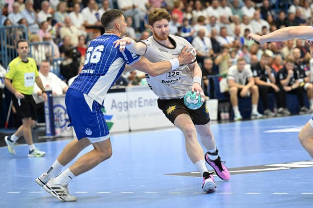 27.09.2026,GER, Handball, Herren, Opel HBL, Saison 2026 2027, 6. Spieltag, VfL Gummersbach vs. Bergischer HC Johannes Wasielewski (BHC 77), im Zweikampf gegen Å tÄ›pan Zeman (VfL Gummersbach 66), DFB DFL regulations prohibit any use of photographs as image sequences and or quasi-video Gummersbach SCHWALBE arena NRW Deutschland Germany Copyright: xNordphoto Meuterx