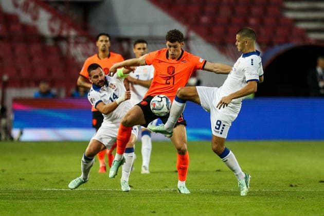 Serbia v Netherlands - UEFA Nations League BELGRADE, SERBIA - SEPTEMBER 27: Ruben van Bommel (21) of Netherlands in action against Andrija Zivkovic (14) and Dejan Joveljic (9) of Serbia during the UEFA Nations League match between Serbia and the Netherlands at the Rajko Mitic Stadium in Belgrade, Serbia on September 27, 2026. Filip Stevanovic Anadolu Belgrade Serbia. Editorial use only. Please get in touch for any other usage.  Copyright: x2026xAnadoluxFilipxStevanovicx
