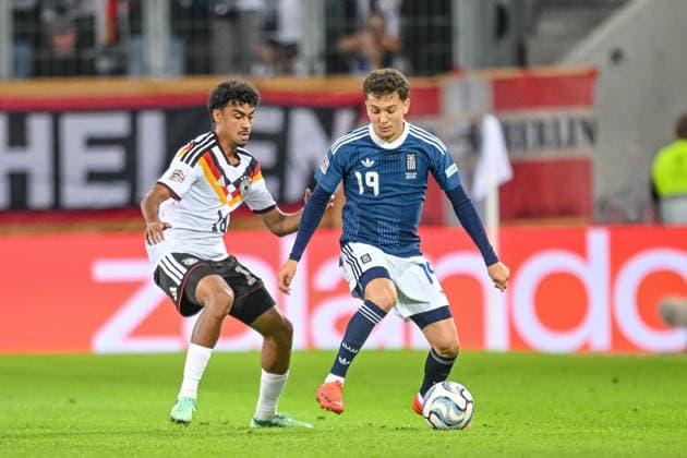 Nathaniel Brown (Germany) and Konstantinos Karetsas (Greece) battle for the ball during the UEFA Nations League 2026 27 group phase match between Germany and Greece at WWK Arena on September 27, 2026 in Augsburg, Germany. (Photo by Harry Langer DeFodi Images) -