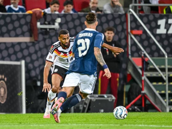 Josha Vagnoman (Germany) and Kostas Tsimikas (Greece) battle for the ball during the UEFA Nations League 2026 27 group phase match between Germany and Greece at WWK Arena on September 27, 2026 in Augsburg, Germany. (Photo by Harry Langer DeFodi Images) -