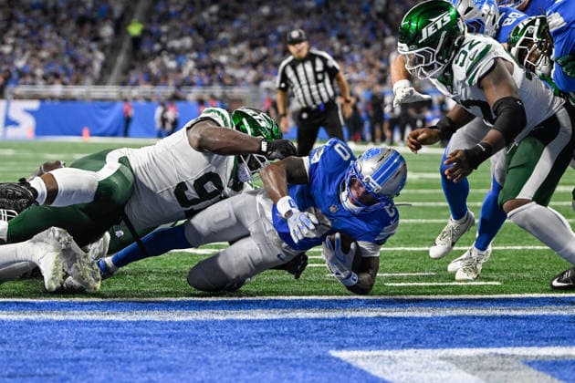 Sep 27, 2026; Detroit, MI, USA; Detroit Lions running back Jahmyr Gibbs (0) runs to a gap for a touchdown at Ford Field. Mandatory Credit: -Cal Media NFL, American Football Herren, USA 2026: Jets Vs Lions SEP 27  - ZUMAc04_ 20260927_zma_c04_061 Copyright: xAllanxDranbergx