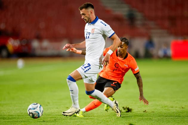 BELGRADE, SERBIA - SEPTEMBER 27: Aleksa Terzic of Serbia Crysencio Summerville of Netherlands during the UEFA Nations League match between Serbia and Netherlands at on September 27, 2026 in Belgrade, Serbia.  Copyright: xDijksxMedia MBxMediax