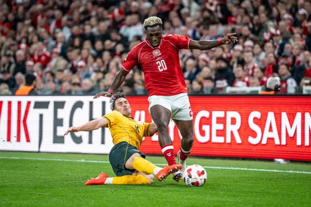 Denmark v Wales, UEFA Nations League, Copenhagen, Denmark Copenhagen, Denmark. 27th, September 2026. Mohamed Daramy (20) of Denmark and Connor Roberts (14) of Wales seen during the UEFA Nations League match between Denmark and Wales at Parken in Copenhagen. Denmark, Copenhagen, Parken  Copyright: xGonzalesxPhoto NicolaixBethelsenx
