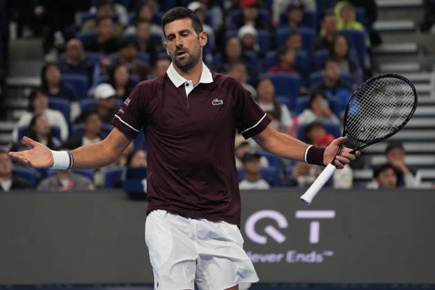 (261006) -- BEIJING, Oct. 6, 2026 -- Novak Djokovic reacts during the men s singles semifinal match between Daniil Medvedev of Russia and Novak Djokovic of Serbia at 2026 China Open tennis tournament in Beijing, China, Oct. 5, 2026. ) (SP)CHINA-BEIJING-TENNIS-CHINA OPEN-MEN S SINGLES(CN) XiexHan