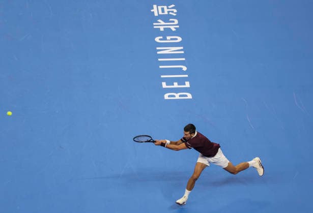 (261006) -- BEIJING, Oct. 6, 2026 -- Novak Djokovic of Serbia hits a return during the men s singles final match against Alex de Minaur of Australia at 2026 China Open tennis tournament in Beijing, China, Oct. 6, 2026. ) (SP)CHINA-BEIJING-TENNIS-CHINA OPEN-MEN S SINGLES-FINAL(CN) BaixXuefei 