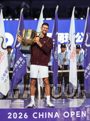 (261006) -- BEIJING, Oct. 6, 2026 -- Novak Djokovic of Serbia poses with the champion trophy during the awarding ceremony for the men s singles final at 2026 China Open tennis tournament in Beijing, China, Oct. 6, 2026. ) (SP)CHINA-BEIJING-TENNIS-CHINA OPEN-MEN S SINGLES-AWARDING CEREMONY(CN) BaixXuefei