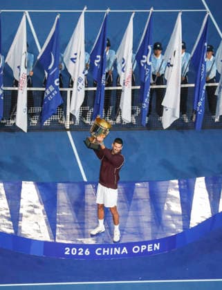 (261006) -- BEIJING, Oct. 6, 2026 -- Novak Djokovic of Serbia holds up the champion trophy during the awarding ceremony for the men s singles final at 2026 China Open tennis tournament in Beijing, China, Oct. 6, 2026. (Photo by Xinhua) (SP)CHINA-BEIJING-TENNIS-CHINA OPEN-MEN S SINGLES-AWARDING CEREMONY(CN) MaxZihan 