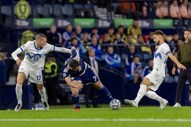 Scotland v Slovenia, UEFA Nations League John McGinn of Scotland national team, Nationalteam keeps the ball while under pressure from David Zec of Slovenia during the UEFA Nations League League B Group B1 between Scotland and Slovenia. Barclays Hampden, Hampden Park, Glasgow, Scotland. 6 October 2026. Hampden Park Barclays Hampden Glasgow Scotland Editorial use only , Copyright: xColinxPoultneyx PSI-24964-0002