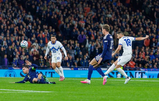 06.10.2026 Scotland v Slovenia, UEFA Nations League, League B Group 1 : Andy Robertson blocks Zak Vipotnik’s shot  Copyright: xKennyxRamsay.Scotlandx NINTCHDBPICT001113842070