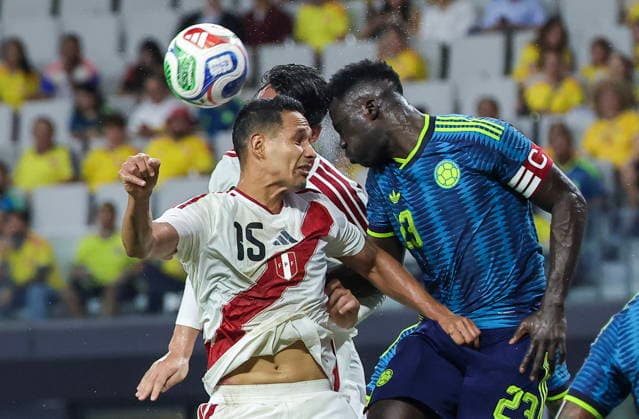 International soccer friendly - Colombia vs. Peru Peru defender Renzo Garces (L) in action against Colombia defender Davinson Sanchez (R) during the international soccer friendly between Colombia and Peru at Nu Stadium in Miami, Florida, USA, 06 October 2026. MIAMI FLORIDA United States  Copyright: xCRISTOBALxHERRERA-ULASHKEVICHx