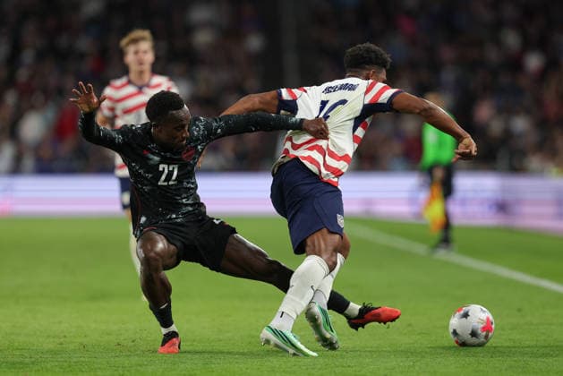SAINT PAUL, MN - OCTOBER 06: United States Alex Freeman (16) and Canada™s Richie Laryea (22) battle for the ball during the second half of the men™s friendly match between the U.S. national team, Nationalteam and Canada™s national team on October 6th, 2026, at Allianz Field in Saint Paul, MN. (Photo by Bailey Hillesheim Icon Sportswire) SOCCER: OCT 06 USA vs Canada EDITORIAL USE ONLY Icon20261006025