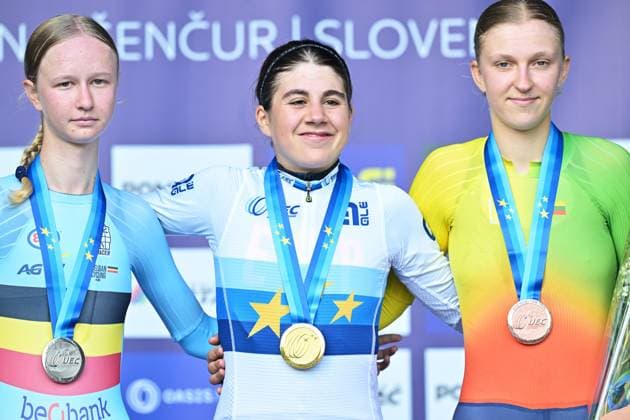 Belgium s Laura Five; Spain s Alejandra Neira Dominguez and Lithuania s Auguste Mikutyte celebrate on the podium of the Women Junior Individual Time Trial race (22km) at the cycling UEC Road European Championships, in Ljubljana, Slovenia, on Wednesday 7 October 2026. The UEC Road European Championships are taking place from 02 to 07 October in Ljubljana, Slovenia. DAVIDxPINTENS  x189034194x