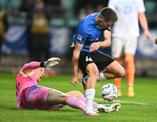 (261007) -- TALLINN, Oct. 7, 2026 -- Iceland s goalkeeper Hakon Rafn Valdimarsson (L) challenges Estonia s Mattias Kait for the ball during the UEFA Nations League 2026 27 League C Group C4 match between Estonia and Iceland at A. Le Coq Arena in Tallinn, Estonia, Oct. 6, 2026. (Photo by Xinhua) (SP)ESTONIA-TALLINN-FOOTBALL-UEFA NATIONS LEAGUE C-ESTONIA VS ICELAND SergeixStepanov 