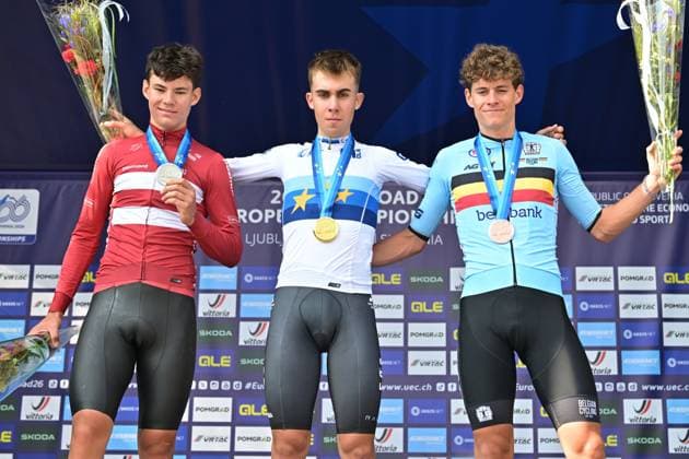 Denmark s Malthe Risbjerg; Spain s Benjamin Noval Suarez and Belgium s Vic De Smet celebrate on the podium of the Men Junior Individual Time Trial race (22km) at the cycling UEC Road European Championships, in Ljubljana, Slovenia, on Wednesday 7 October 2026. The UEC Road European Championships are taking place from 02 to 07 October in Ljubljana, Slovenia. DAVIDxPINTENS  x189038167x