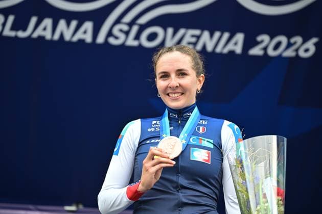 France s Juliette Berthet , winner of the bronze medal celebrates on the podium of the Women Elite Individual Time Trial race (22km) at the cycling UEC Road European Championships, in Ljubljana, Slovenia, on Wednesday 7 October 2026. The UEC Road European Championships are taking place from 02 to 07 October in Ljubljana, Slovenia. DAVIDxPINTENS  x189053691x