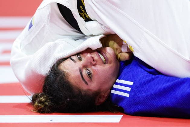 AZERBAIJAN, BAKU - OCTOBER 7, 2026: Kerem Primo of Israel competes with Haruka Kaju of Japan in a -63 kg bout as part of the 2026 World Judo Championships at the National Gymnastics Arena. Mikhail Sinitsyn TASS  98913905