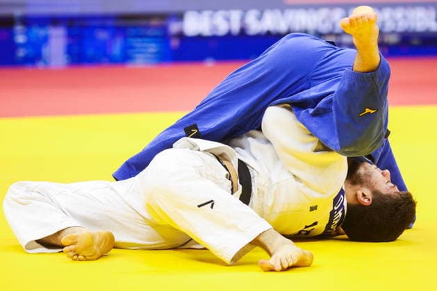 AZERBAIJAN, BAKU - OCTOBER 7, 2026: Abylaikhan Zhubanazar (top) of Kazakhstan and Omar Radzhabli of Azerbaijan compete in their -81 kg bout as part of the 2026 World Judo Championships at the National Gymnastics Arena. Mikhail Sinitsyn TASS  98915130