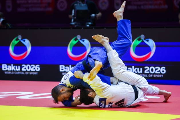 AZERBAIJAN, BAKU - OCTOBER 7, 2026: Abylaikhan Zhubanazar (top) of Kazakhstan and Omar Radzhabli of Azerbaijan compete in their -81 kg bout as part of the 2026 World Judo Championships at the National Gymnastics Arena. Mikhail Sinitsyn TASS  98914711