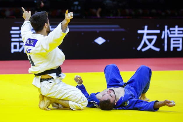 AZERBAIJAN, BAKU - OCTOBER 7, 2026: Omar Radzhabli (L) of Azerbaijan wins Abylaikhan Zhubanazar of Kazakhstan in their -81 kg bout as part of the 2026 World Judo Championships at the National Gymnastics Arena. Mikhail Sinitsyn TASS  98915555