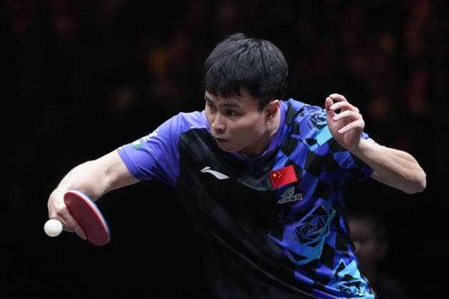 (261008) -- BEIJING, Oct. 8, 2026 -- Zhou Qihao of China hits a return during the men s singles round of 16 match between Zhou Qihao of China and Harimoto Tomokazu of Japan at 2026 World Table tennis, Tischtennis (WTT) China Smash in Beijing, China, Oct. 8, 2026. ) (SP)CHINA-BEIJING-TABLE TENNIS-WTT-CHINA SMASH-MEN S SINGLES (CN) JuxHuanzong 
