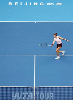 (261008) -- BEIJING, Oct. 8, 2026 -- Karolina Muchova of the Czech Republic hits a return during the women s singles quarterfinal match between Karolina Muchova of the Czech Republic and Nikola Bartunkova of the Czech Republic at 2026 China Open tennis tournament in Beijing, China, Oct. 8, 2026. ) (SP)CHINA-BEIJING-TENNIS-CHINA OPEN-WOMEN S SINGLES (CN) ZhangxChenlin 