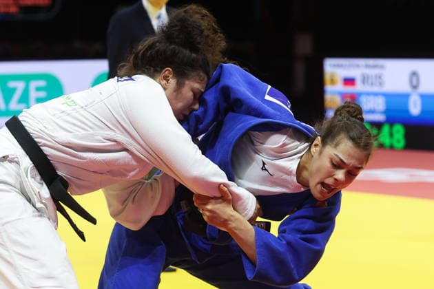AZERBAIJAN, BAKU - OCTOBER 8, 2026: Madina Taimazova (L) of Russia and Aleksandra Andric of Serbia compete in their -70 kg bout as part of the 2026 World Judo Championships at the National Gymnastics Arena. Mikhail Sinitsyn TASS  98954383
