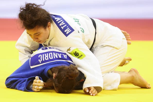 AZERBAIJAN, BAKU - OCTOBER 8, 2026: Madina Taimazova (top) of Russia and Aleksandra Andric of Serbia compete in their -70 kg bout as part of the 2026 World Judo Championships at the National Gymnastics Arena. Mikhail Sinitsyn TASS 98954769
