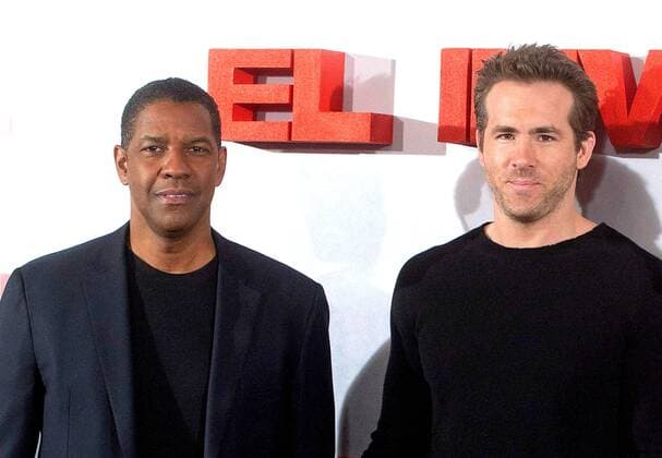 Denzel Washington und Ryan Reynolds bei dem Photocall zu dem Film Safe House am 31.01.2012 in Madrid Safe House Madrid Photocall 2012 
