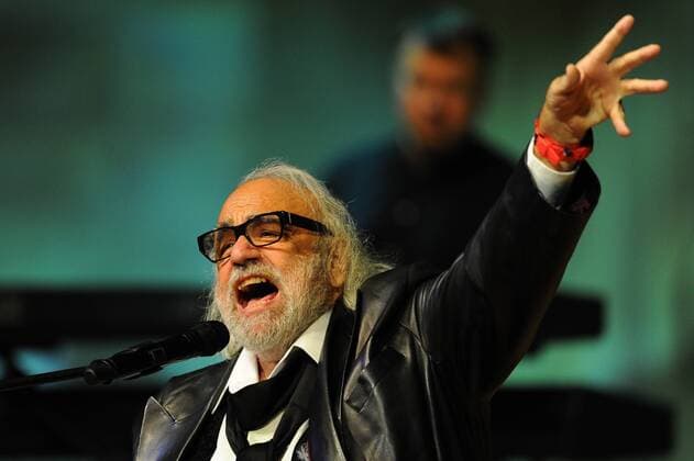 ITAR-TASS: MOSCOW, RUSSIA. SEPTEMBER 21, 2012. Greek singer Demis Roussos performs during a concert at Moscow s International House of Music. The concert marks the 45th anniversary of Roussos professional debut.  RE108F01