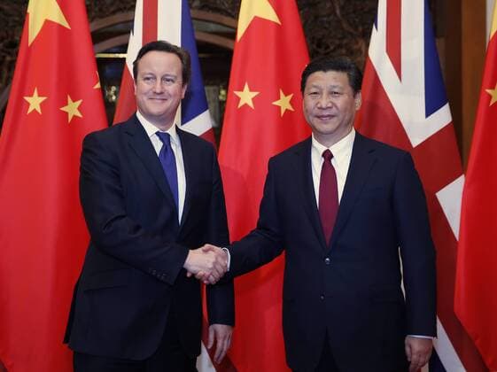 (131202) -- BEIJING, Dec. 2, 2013 (Xinhua) -- Chinese President Xi Jinping (R) shakes hands with visiting British Prime Minister David Cameron during their meeting in Beijing, capital of China, Dec. 2, 2013.(Xinhua Ju Peng) (wjq) CHINA-BEIJING-XI JINPING-BRITISH PM-MEETING (CN) 
