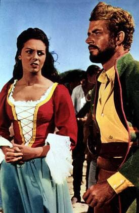 Michele Mercier, Richard Harrison In letzter Sekunde wird David (Richard Harrison) vom Piratenkapitaen Van Artz gerettet. Er verliebt sich in dessen Tochter Jennifer (Michele Mercier). 1961 UnitedArchives01347309