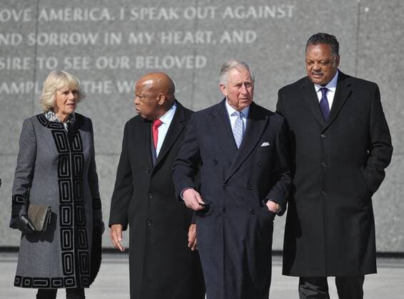 Britain s Prince Charles (2rd R) chats with civil rights leader Jesse Jackson while his wife Camilla (L), Duches of Cornwall chats with Rep John Lewis, D-GA, during a visit to the Martin Luther King Memorial Jr. Memorial on March 18, 2015 in Washington, DC. Prince Charles (C) and his wife Camilla, Duchess of Cornwall, are on a four-day trip to the United States. Pool  WAX20150318158 MANDELxNGAN