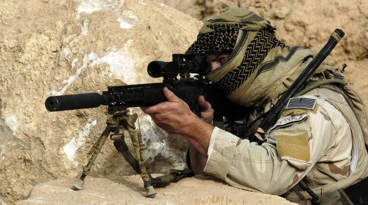 Rawah, Iraq, September 7, 2007 A U.S. Special Forces soldier conducts rehearsal, training and pre-operation conformation on the MK-12 sniper rifle.  Copyright: StocktrekxImages stk104387m