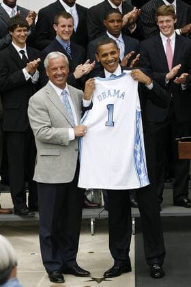 May 11, 2009 - Washington, District of Columbia, USA - UNC Men s Basketball Head Coach ROY WILLIAMS presents President BARACK OBAMA with an honorary UNC Basketball Jersey outside of the White House. President Obama hosted the University of North Carolina Basketball Team at the White House to congratulate them on their NCAA Tournament Victory.  - ZUMA
