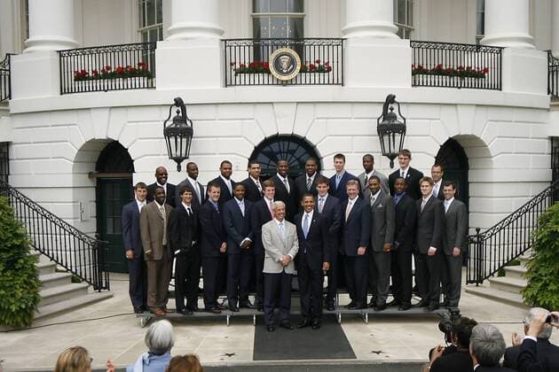 May 11, 2009 - Washington, District of Columbia, USA - UNC Men s Basketball Head Coach ROY WILLIAMS, front right, and President BARACK OBAMA, front left, stand for a photo with the UNC Men s Basketball team behind them outside of the White House. President Obama hosted the University of North Carolina Basketball Team at the White House to congratulate them on their NCAA Tournament Victory.  - ZUMA