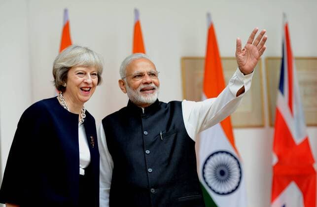 (161107) -- NEW DELHI, Nov. 7, 2016 -- Indian Prime Minister Narendra Modi (R) and visiting British Prime Minister Theresa May pose for photos before their meeting at Hyderabad House in New Delhi, India, Nov. 7, 2016. British Prime Minister Theresa May arrived in New Delhi late Sunday night on a three-day trade-focused visit aiming at bolstering bilateral ties in the key areas of trade, investment, defence and security. )(zhf) INDIA-NEW DELHI-BRITAIN-PM-VISIT ParthaxSarkar 