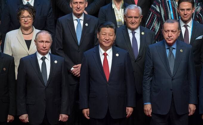 May 15, 2017 - Beijing, China - Chinese President Xi Jinping, center, Russian President Vladimir Putin, left, and Turkish President Recep Tayyip Erdogan, right, stand together for the group photo during the Belt and Road Forum for International Cooperation at the China National Convention Center May 15, 2017 in Beijing, China. Thirty heads of state gathered in Beijing to reaffirm their commitment to build an open economy and ensure free and inclusive trade. Beijing China - ZUMAp138 20170515_zaa_p138_004 Copyright: xAlexeixNikolskyx