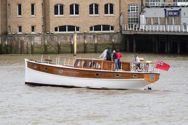 September 6, 2017 - London, London, UK - LONDON, UK. Dunkirk Little Ships and their owners arrive at St Katharine Docks, passing the Royal Navy base, HMS President on the River Thames, in preparation for the Classic Boat Festival this weekend. The Totally Thames Classic Boat Festival includes 40 vintage work boats, sailing and motor yachts and 14 of the Dunkirk Little Ships. London UK  - ZUMAl94_ 20170906_zaf_l94_030 Copyright: xVickiexFloresx