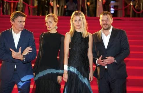 Television presenter and director Eric Van Looy, Isabel Lucas, Rachael Taylor and Television maker Bart De Pauw pictured during the opening of the 41st Film Fest Gent , film festival in Gent, with the premiere of the American remake of the film Loft , directed by Belgian Eric Van Looy, Tuesday 14 October 2014.  NICOLASxMAETERLINCK 05197922