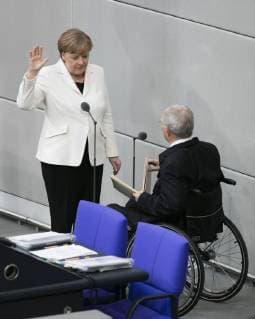 Bilder des Tages Bundeskanzlerin Angela Merkel (L), CDU, und Wolfgang Schaeuble, CDU, im Rahmen der Vereidigung der neuen Bundesregierung in Berlin, 14.03.2018. Berlin Deutschland