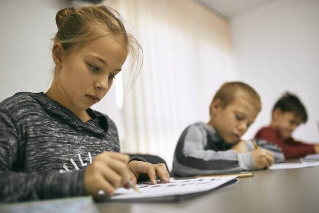 Students learning in class model released Symbolfoto property released  ZEDF01212