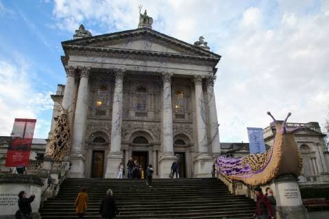 December 2, 2018 - London, United Kingdom - Giant and illuminated leopard slug sculptures by artist Monster Chetwynd seen on the facade of Tate Britain..The Tate Britain Winter Commission by artist Monster Chetwynd transformed Tate Britain s iconic facade with an unorthodox Christmas lights display: two giant and illuminated leopard slug sculptures LED slug trails across the building s facade. London United Kingdom - ZUMAs197 20181202_zaa_s197_146 Copyright: xDinendraxHariax